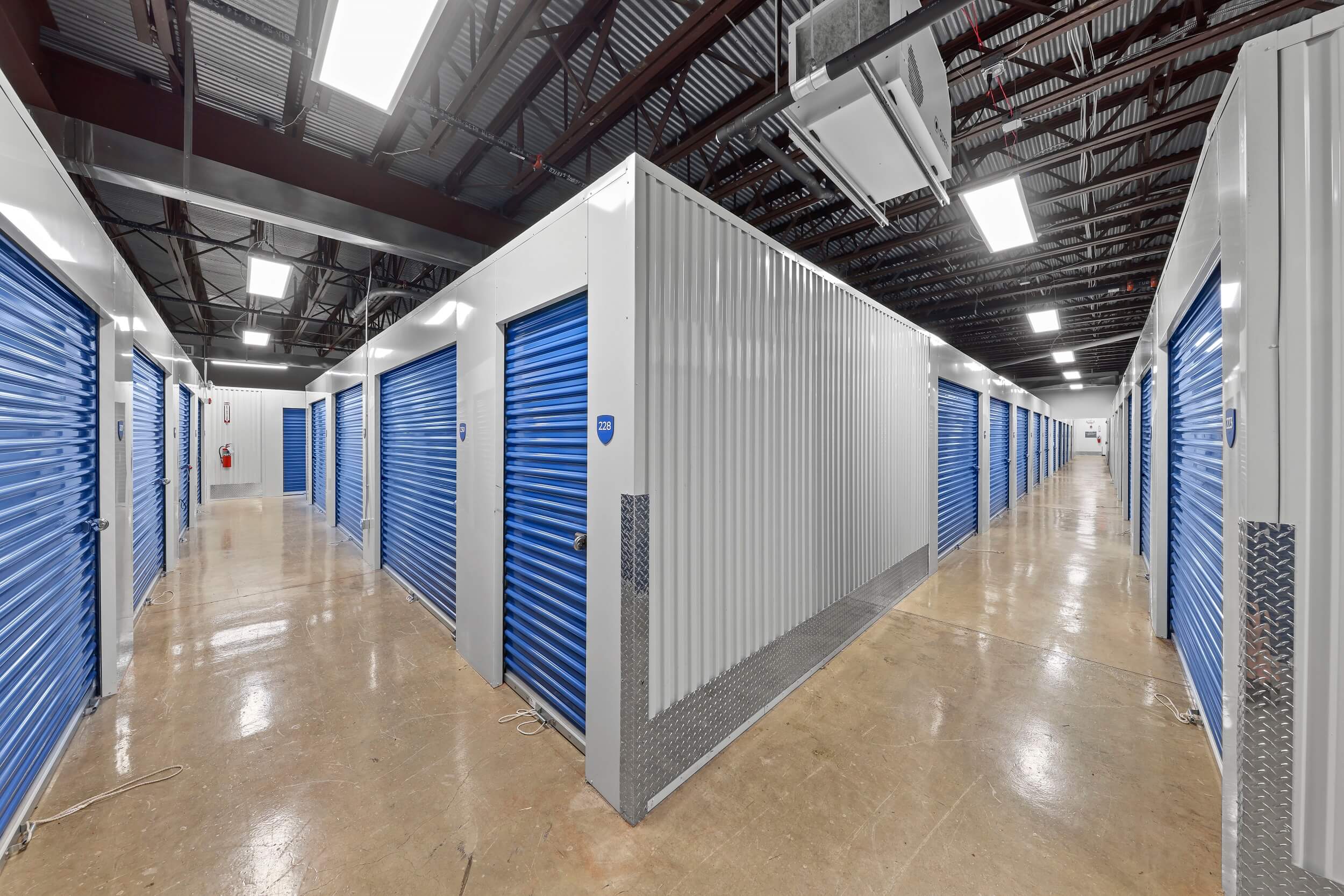 Hallway of Indoor Storage Units with Blue Doors